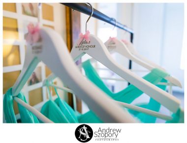 close up of wedding clothes hangers