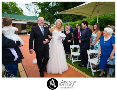 bride walks down aisle