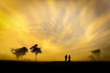 southern-highlands-wedding bride and groom walk at sunset