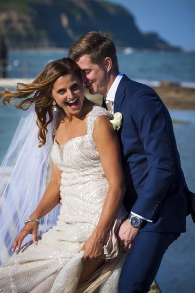 wollongong-beach-wedding-bride laughing and dancing