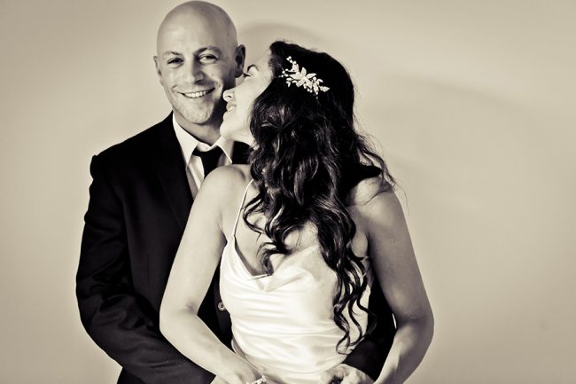 Belgenny-Farm-wedding-reception-bride-leans-into-groom-for-a-kiss